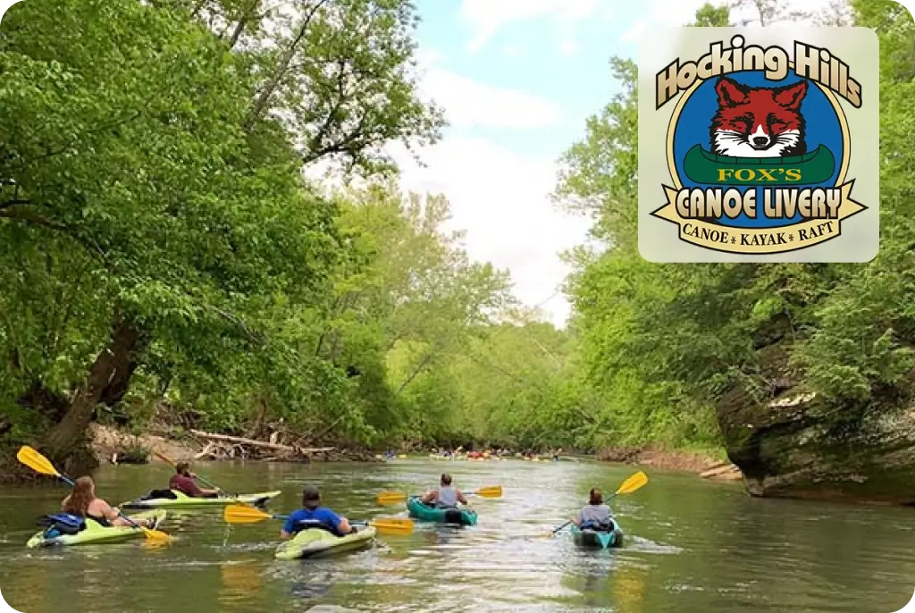 People are having fun kayaking on the river in Hocking